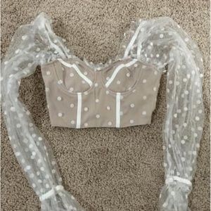 White polka dot shirt
